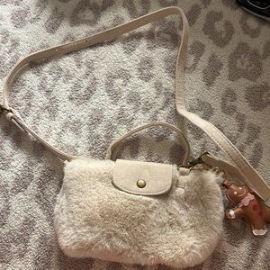 Aerie fur mini crossbody bag with gingerbread keychain